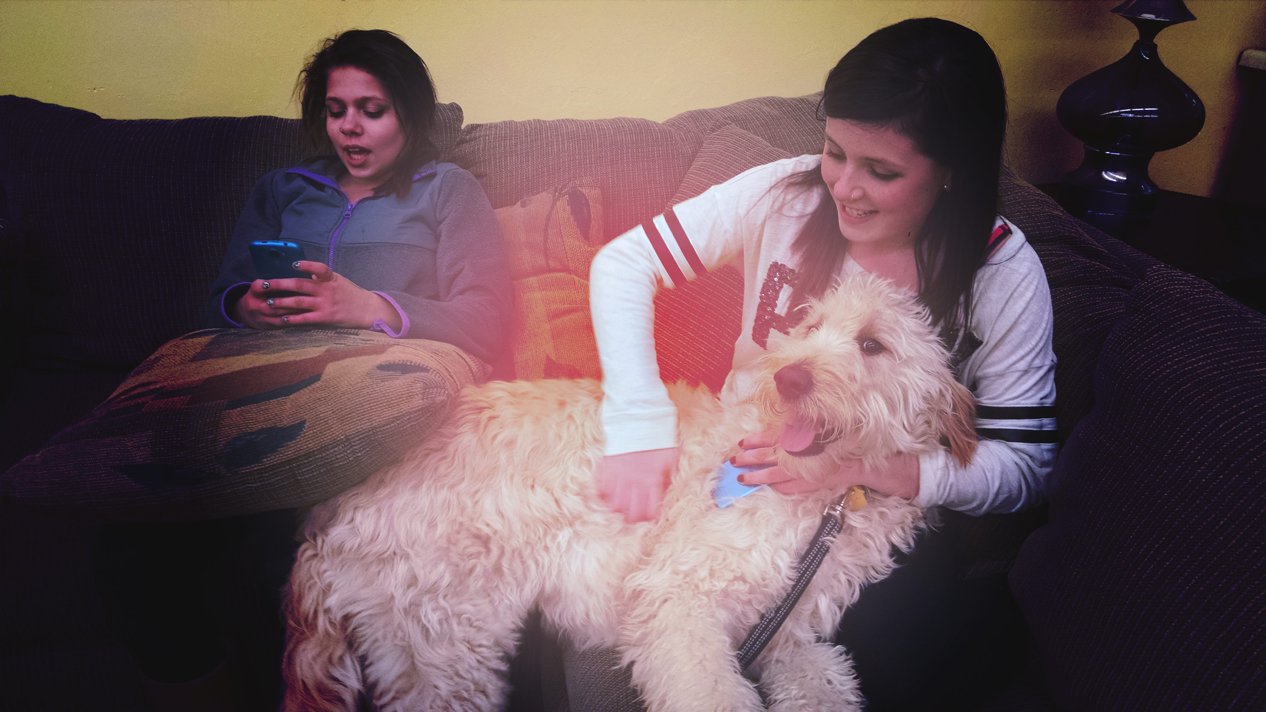 Girls On Couch With Dog
